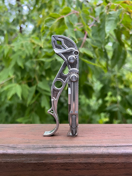 Compact billet multi-tool with pry bar and bit holder